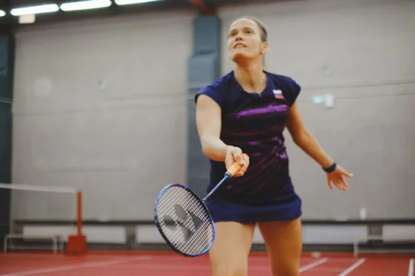 badminton match intense rally